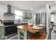 Well-equipped kitchen featuring stainless steel appliances, an island and modern finishes at 2222 Pleasant St, Indianapolis, IN 46203