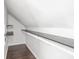 Bright walk-in closet featuring custom shelving and hardwood floors at 2222 Pleasant St, Indianapolis, IN 46203