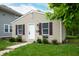 Well-maintained single-Gathering home with siding, shutters, and landscaped front yard at 2402 Adams St, Indianapolis, IN 46218