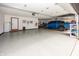 Well-organized and clean garage featuring a large vehicle and ample space at 28 Patriot Ct, Greenfield, IN 46140