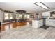 Open concept kitchen with dining area, granite counters and modern appliances at 28 Patriot Ct, Greenfield, IN 46140