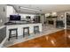 Open kitchen featuring a breakfast bar, modern appliances, and a fireplace at 28 Patriot Ct, Greenfield, IN 46140