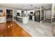 Well-lit kitchen featuring modern appliances, black granite counters, and breakfast bar at 28 Patriot Ct, Greenfield, IN 46140