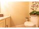 Half bathroom featuring tile flooring and modern fixtures at 2875 Prairie Stream Way, Columbus, IN 47203