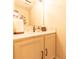 Well-lit bathroom with granite countertops and a decorative faucet at 2875 Prairie Stream Way, Columbus, IN 47203