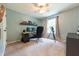 Bright bedroom featuring a ceiling fan, natural light and a telescope at 2875 Prairie Stream Way, Columbus, IN 47203