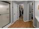 Bathroom featuring wood flooring, glass enclosed shower and walk-in closet at 319 Mcintosh Ln, Westfield, IN 46074