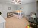 Bedroom with carpet flooring, a bunk bed and a comfortable gray chair at 319 Mcintosh Ln, Westfield, IN 46074