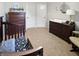 Bedroom with carpet flooring, a crib, dresser with changing pad and a rocking chair at 319 Mcintosh Ln, Westfield, IN 46074