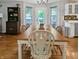 Dining area featuring a wooden table, chairs, and views to the backyard at 319 Mcintosh Ln, Westfield, IN 46074