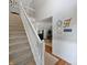 Bright entryway with a staircase and view of the living space featuring a mix of flooring at 319 Mcintosh Ln, Westfield, IN 46074