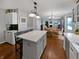 Bright kitchen with stainless steel appliances, quartz countertop and dark backsplash at 319 Mcintosh Ln, Westfield, IN 46074