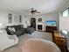 Cozy living room with a fireplace, stylish rug, lots of seating and a large window at 319 Mcintosh Ln, Westfield, IN 46074