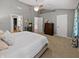 Main bedroom with gray walls, vaulted ceiling, ceiling fan and carpet flooring at 319 Mcintosh Ln, Westfield, IN 46074