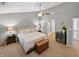 Spacious main bedroom with gray walls, ceiling fan and attached en-suite bathroom at 319 Mcintosh Ln, Westfield, IN 46074