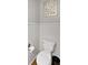 Powder room featuring new paint, decorative elements, and a toilet with white trim at 319 Mcintosh Ln, Westfield, IN 46074