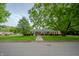 Cozy single-story brick home with a well-manicured lawn and stone pathway at 3457 W 58Th St, Indianapolis, IN 46228