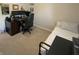 Bedroom featuring a desk, computer, bed, and carpeting at 425 Bridgewater S Ln, Muncie, IN 47304