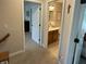Hallway with access to bathroom and bedroom at 425 Bridgewater S Ln, Muncie, IN 47304