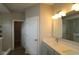 Bathroom with double sinks, modern fixtures, and walk-in closet at 4250 Ironclad Dr, Bargersville, IN 46106
