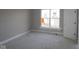 Bright bedroom with natural light from window and white door offering a comfortable and serene atmosphere at 4250 Ironclad Dr, Bargersville, IN 46106
