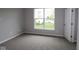 Cozy bedroom with plush carpet and ample natural light at 4250 Ironclad Dr, Bargersville, IN 46106