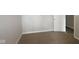 This bedroom has neutral walls with tan carpet and a white baseboard trim at 4250 Ironclad Dr, Bargersville, IN 46106