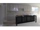 Bright kitchen features unfinished island, white cabinets and stainless appliances, offering modern elegance at 4250 Ironclad Dr, Bargersville, IN 46106