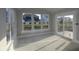 Sun-lit living room with large windows and sliding glass door, perfect for relaxing and entertaining at 4250 Ironclad Dr, Bargersville, IN 46106