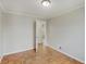 Bedroom featuring neutral walls and parquet floors at 4337 English Ave, Indianapolis, IN 46201