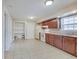 A spacious kitchen featuring wooden cabinets and lots of storage at 4337 English Ave, Indianapolis, IN 46201