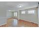 Inviting living room showcasing parquet floors and large windows at 4337 English Ave, Indianapolis, IN 46201