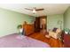 Comfortable bedroom with hardwood floors and furniture at 4450 N St Rd 39, Danville, IN 46122