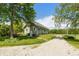 Classic home showcasing mature trees, a private setting, and a charming facade at 4450 N St Rd 39, Danville, IN 46122