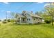 Charming home featuring a covered front porch, well-maintained lawn, and classic architectural details at 4450 N St Rd 39, Danville, IN 46122