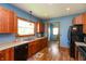Kitchen featuring wooden cabinets, stainless steel appliances, and a double sink at 4450 N St Rd 39, Danville, IN 46122
