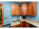 Kitchen featuring wooden cabinets, light countertops, and stainless steel appliances at 4450 N St Rd 39, Danville, IN 46122