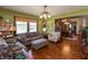 Inviting living room with hardwood floors, comfortable seating, and dining room view at 4450 N St Rd 39, Danville, IN 46122