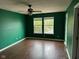 Bedroom with hardwood flooring, and plenty of natural light at 4456 Redcliff N Ln, Plainfield, IN 46168