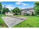 Backyard featuring a basketball court, shed and landscaped yard at 4506 Tarragon Dr, Indianapolis, IN 46237