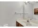 Bathroom featuring a vanity with a wood cabinet and a large mirror above it at 4506 Tarragon Dr, Indianapolis, IN 46237