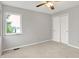Bedroom offers large window with water view and a spacious closet at 4506 Tarragon Dr, Indianapolis, IN 46237
