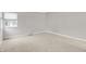 Bedroom featuring neutral carpet, natural light and a fresh coat of paint at 4506 Tarragon Dr, Indianapolis, IN 46237