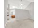Large main bedroom boasts vaulted ceilings with skylights and an en suite bathroom at 4506 Tarragon Dr, Indianapolis, IN 46237