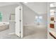 View into main bedroom, adjacent bathroom with soaking tub at 4506 Tarragon Dr, Indianapolis, IN 46237