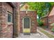 Charming brick exterior with a unique arched entryway and decorative accents at 521 Kessler Blvd E Dr, Indianapolis, IN 46220
