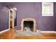 Close-up of a decorative fireplace with tiled surround, adding character to the room at 521 Kessler Blvd E Dr, Indianapolis, IN 46220