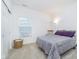 Bedroom boasting natural light, a large bed, and neutral walls, offering a cozy retreat at 5304 Maywood Dr, Whitestown, IN 46075