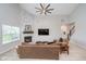 Comfortable living room with stone fireplace and views of the staircase to the second floor at 5304 Maywood Dr, Whitestown, IN 46075