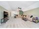 Living room with plush sofas, a mounted TV, and lots of open space for relaxing at 5304 Maywood Dr, Whitestown, IN 46075